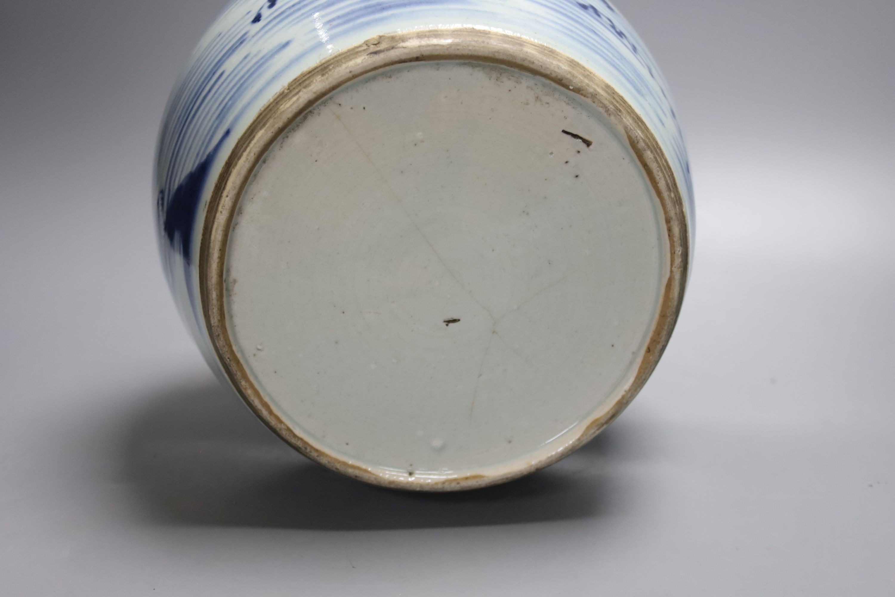 A group of 18th century Chinese export blue and white dishes, plates and a jar, the jar 21.5cm high